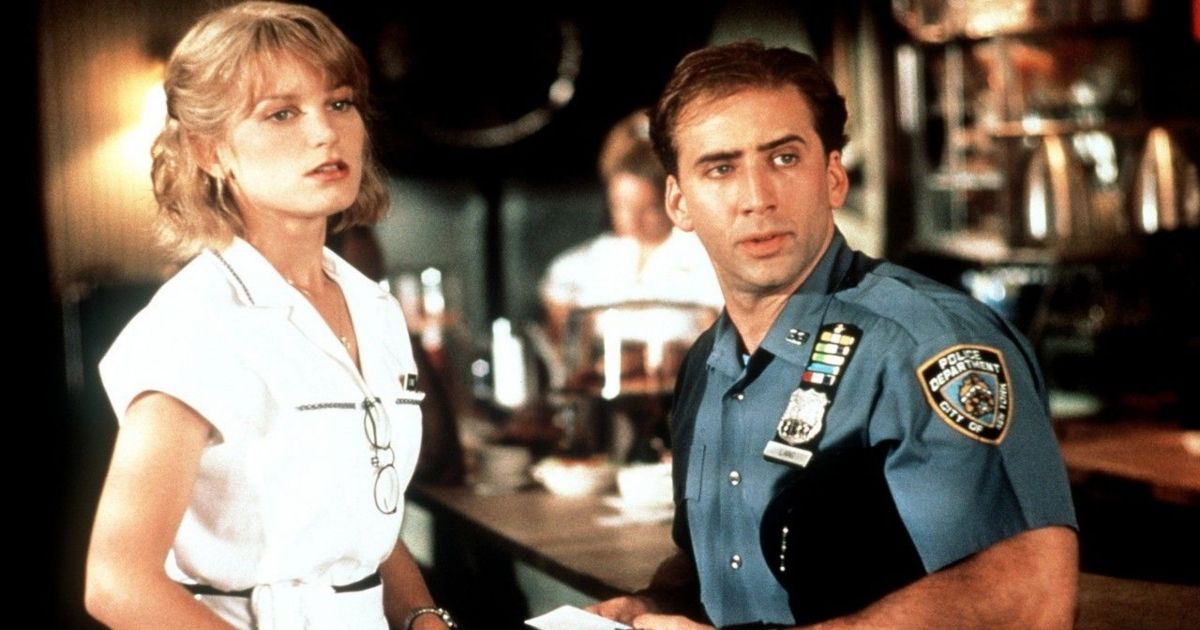 Bridget Fonda and Nicolas Cage in It Could Happen to You (1994)