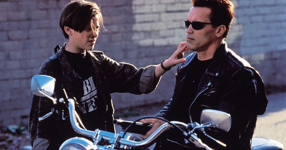 John Connor reaching out to feel The Terminator's face