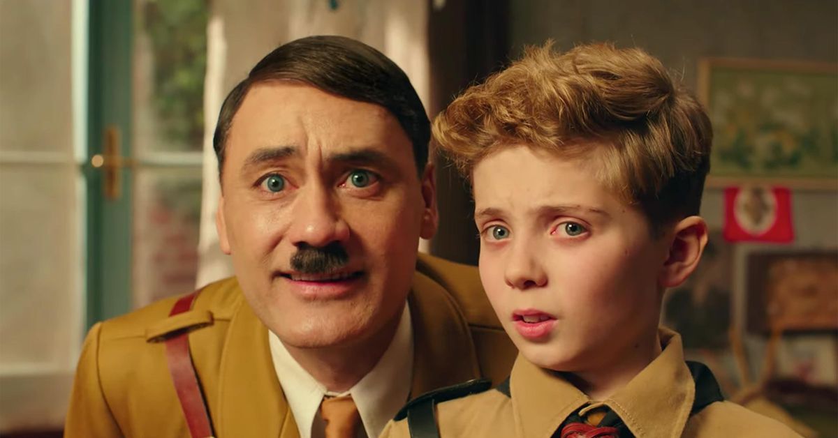 Taika Waititi as Hitler as he and his young buddy stare at the camera in Jojo Rabbit