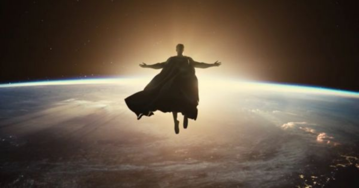 Superman stretches his arms outside of Earth like Christ in Justice League