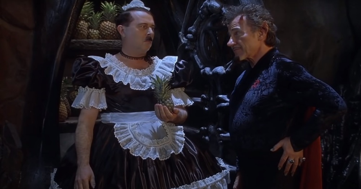 Harvey Keitel as the devil torturing Hitler in a maid uniform in Little Nicky