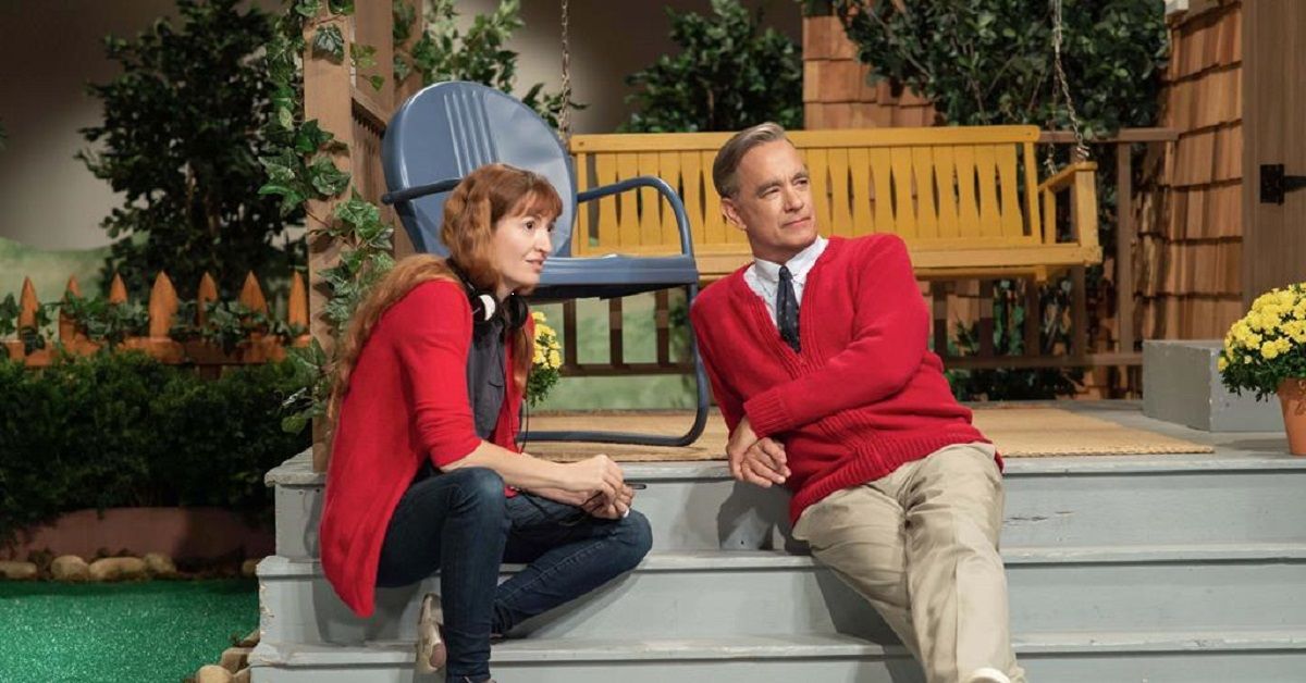 Marielle Heller on the porch steps with Tom Hanks in Beautiful Day in the Neighborhood