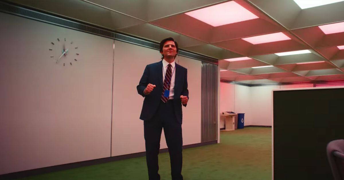 Mark dances terribly in the red-lit office of Severance