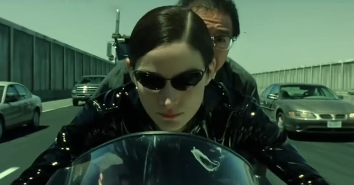 Trinity drives a motorcycle in The Matrix Reloaded