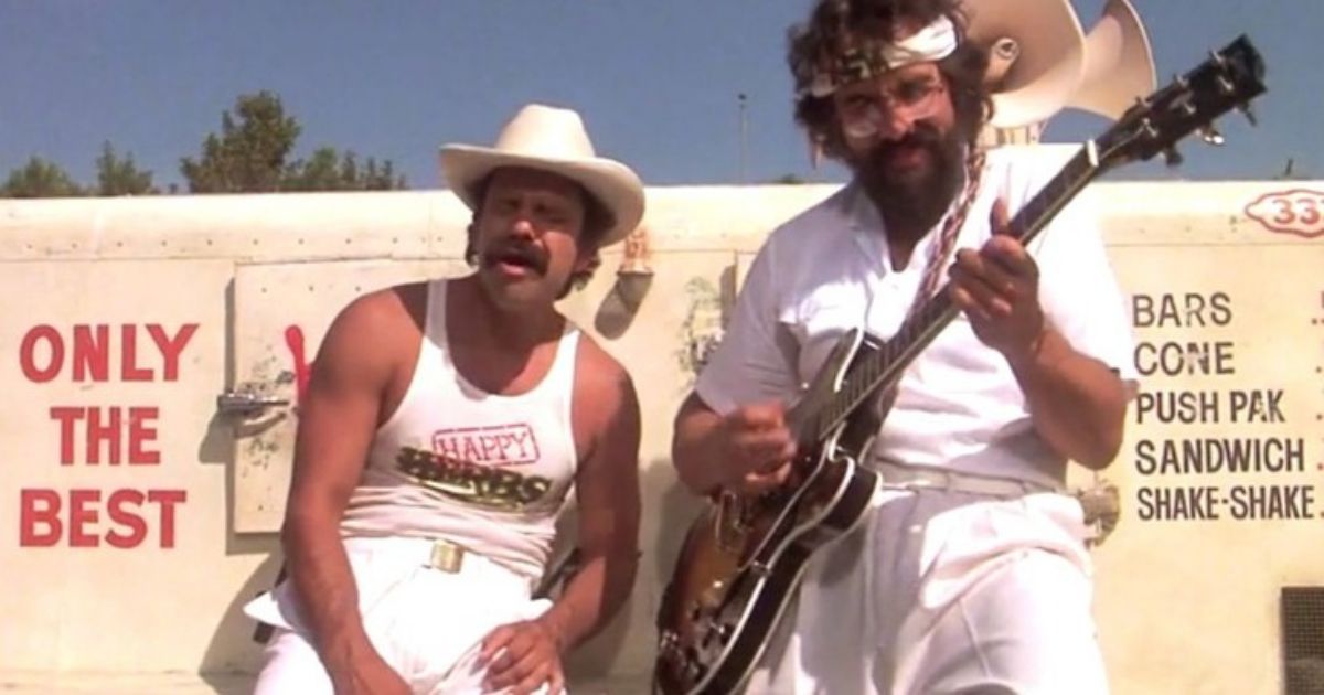 Cheech and Chong play guitar outside a food truck in Nice Dreams