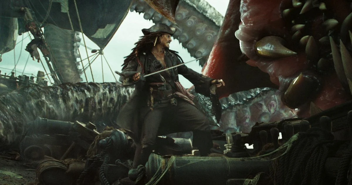 Johnny Depp on a boat fights a sea monster in Pirates of the Caribbean Dead Man's Chest