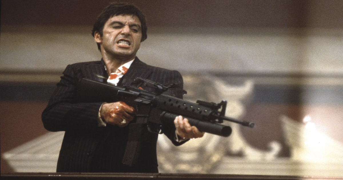 Pacino holds a gun in Scarface