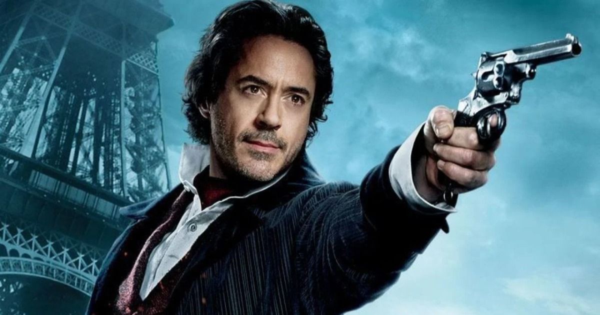 Robert Downey Jr. as Sherlock Holmes points a gun