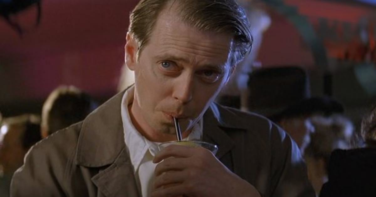 Steve Buscemi sipping a drink in Con Air