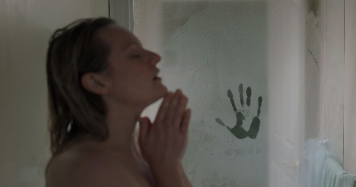 Elizabeth Moss takes a shower near The Invisible Ma