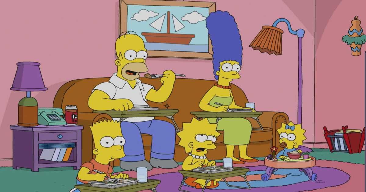 The Simpsons family watching TV