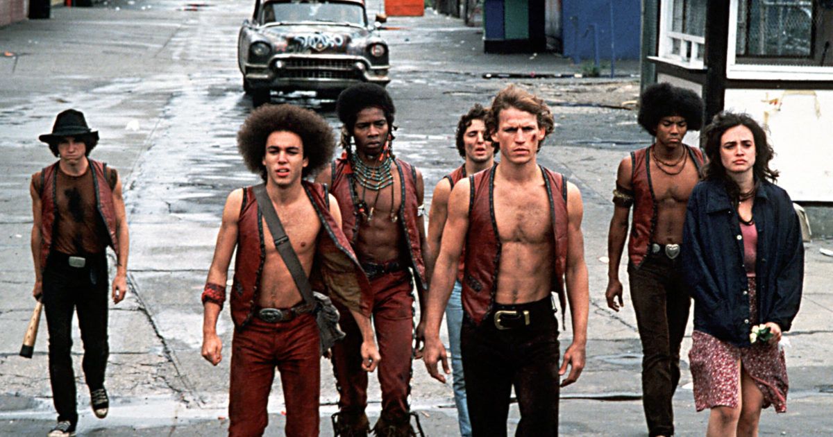 Cast of The Warriors walk in the street
