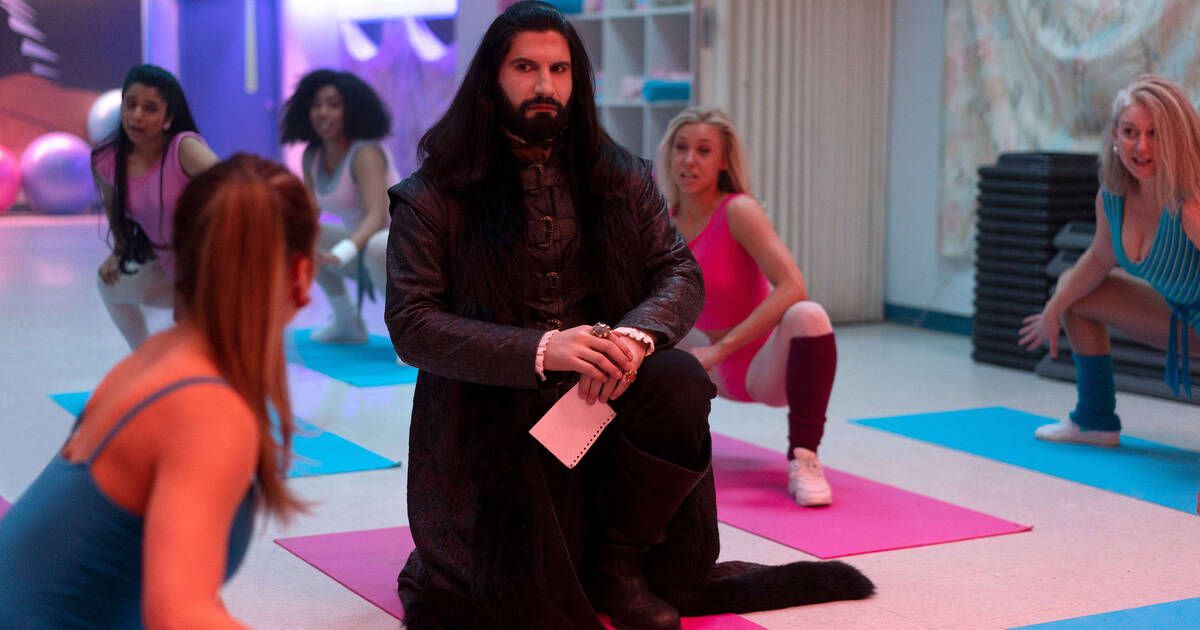 A vampire sits in a yoga class in What We Do in the Shadows