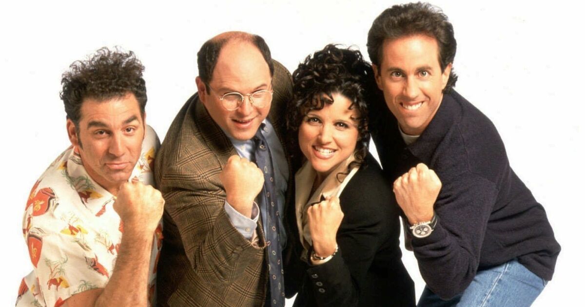 The cast of Seinfeld posing