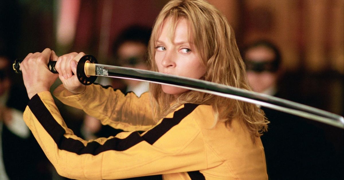 Uma Thurman holds a sword in Kill Bill