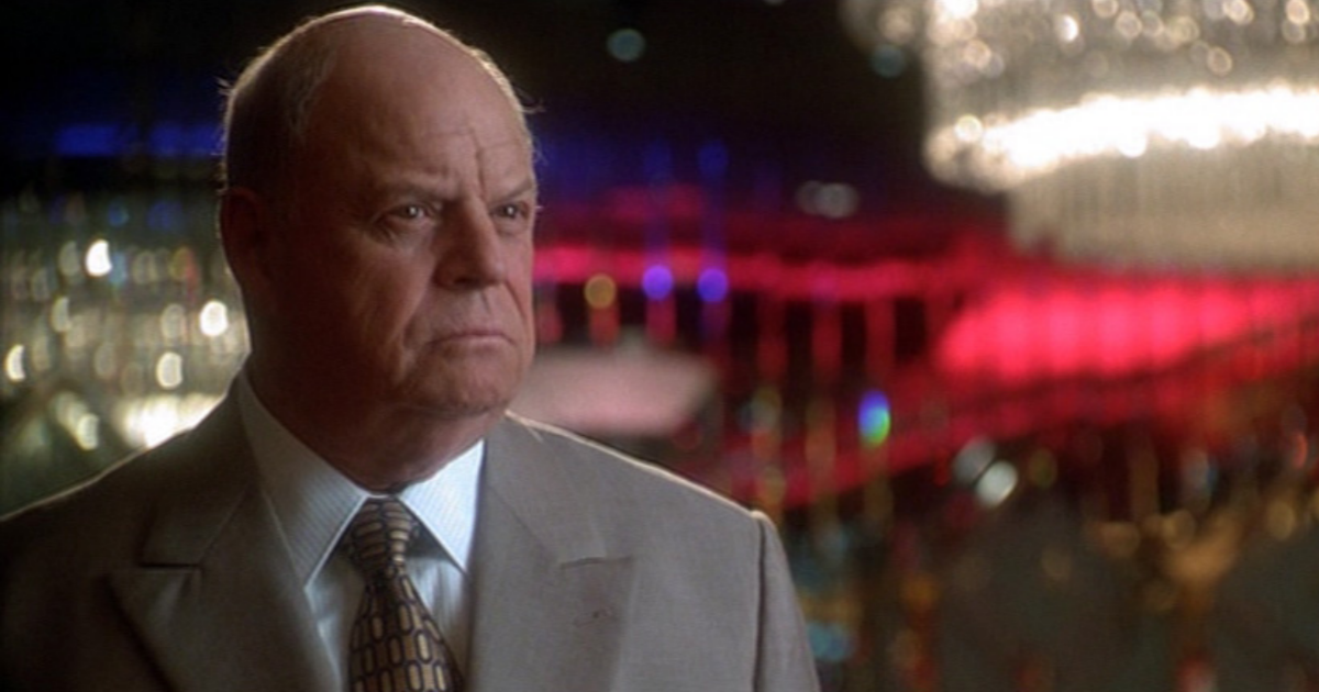 Don Rickles in Casino with the lights and games of the casino in the out of focus background