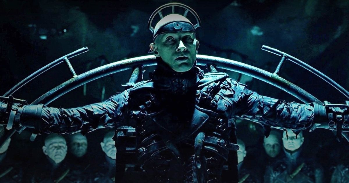 Richard O'Brien as Mr. hand in Dark City at the council of Strangers