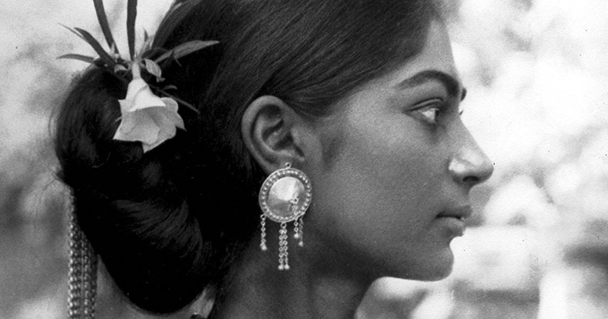 Side profile of Indian woman.