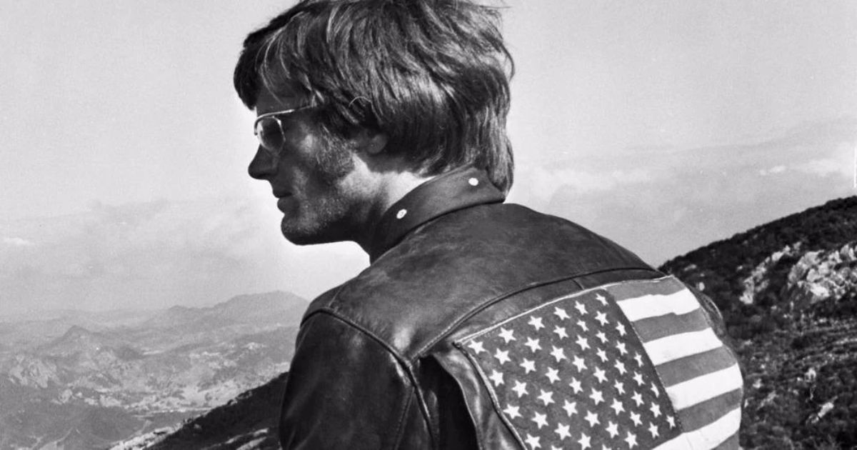 Peter Fonda wearing a leather jacket with the U.S. flag in Easy Rider