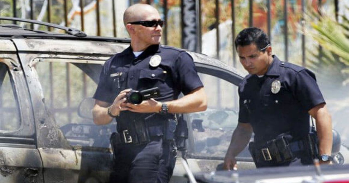 Jake Gyllenhaal and Michael Cena in End of Watch