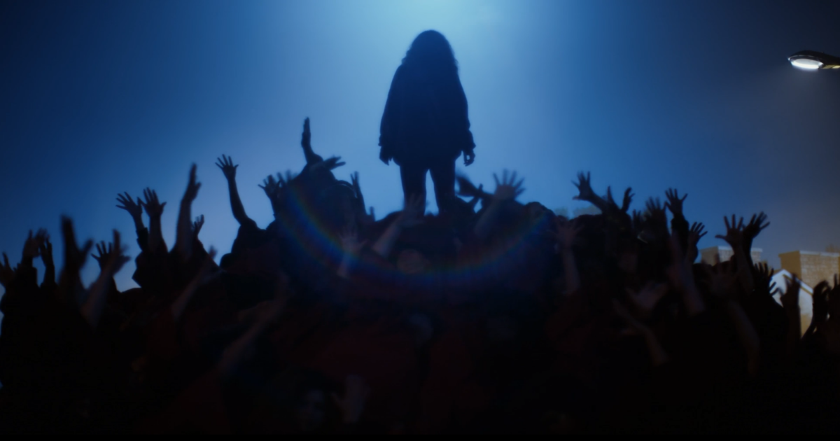 Rue standing on top of a rave in Euphoria