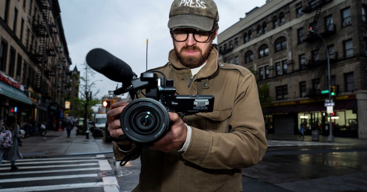 Wilson points a camera to the camera in How To With John Wilson