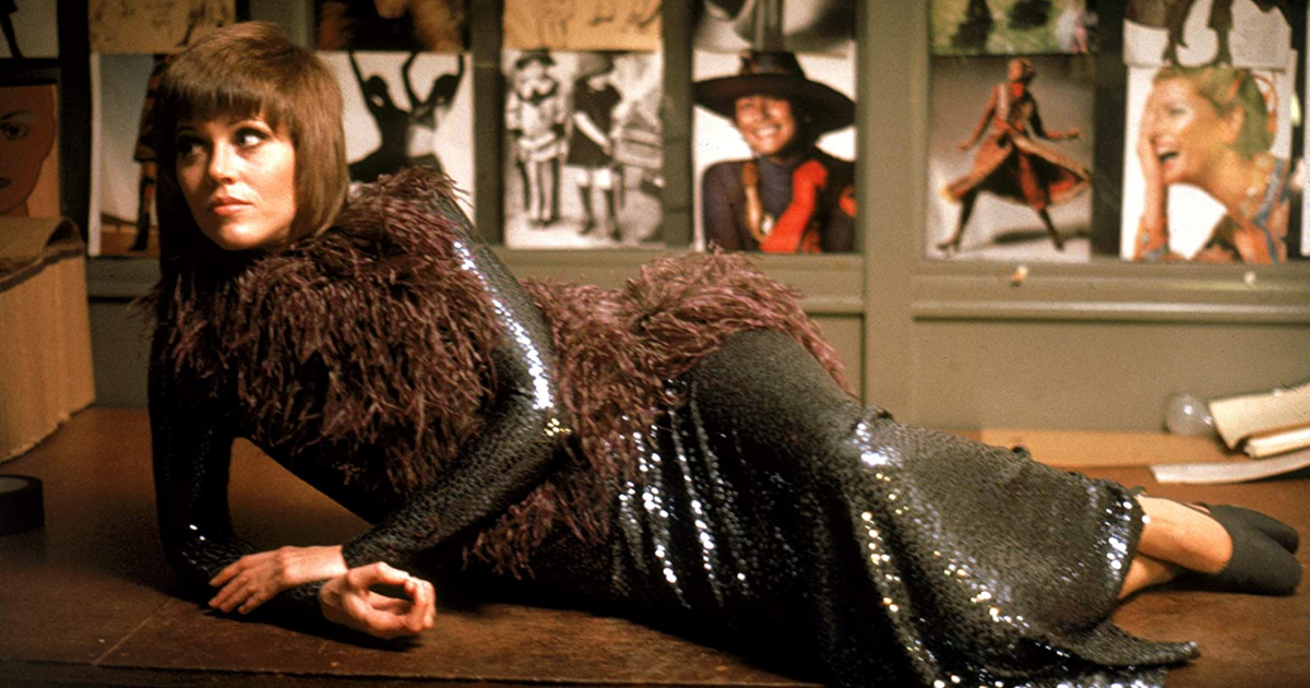 Jane Fonda reclining in nice clothes in Klute 