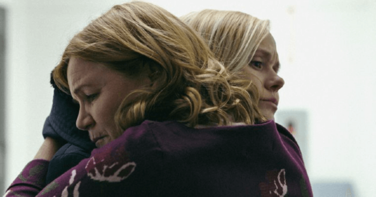 Mare Winningham and Alison Pill hug in All My Puny Sorrows