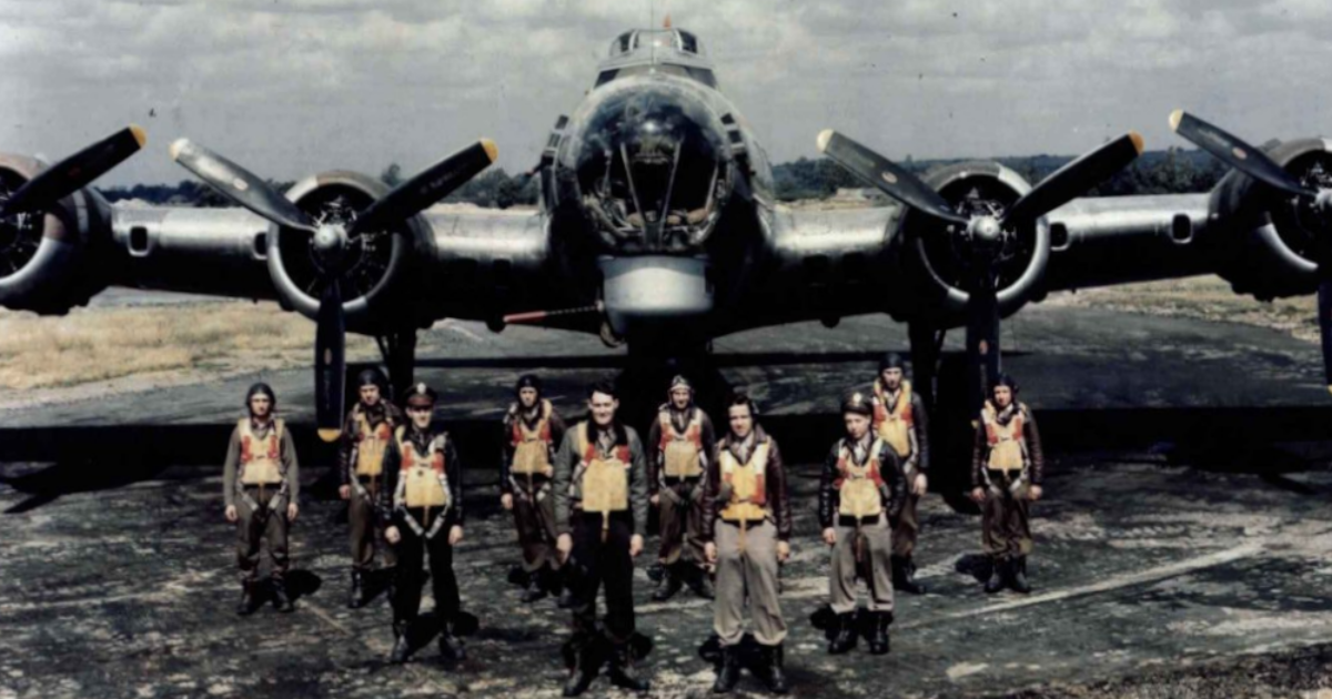 Air Force men line up in front of a plane in Masters of the Air