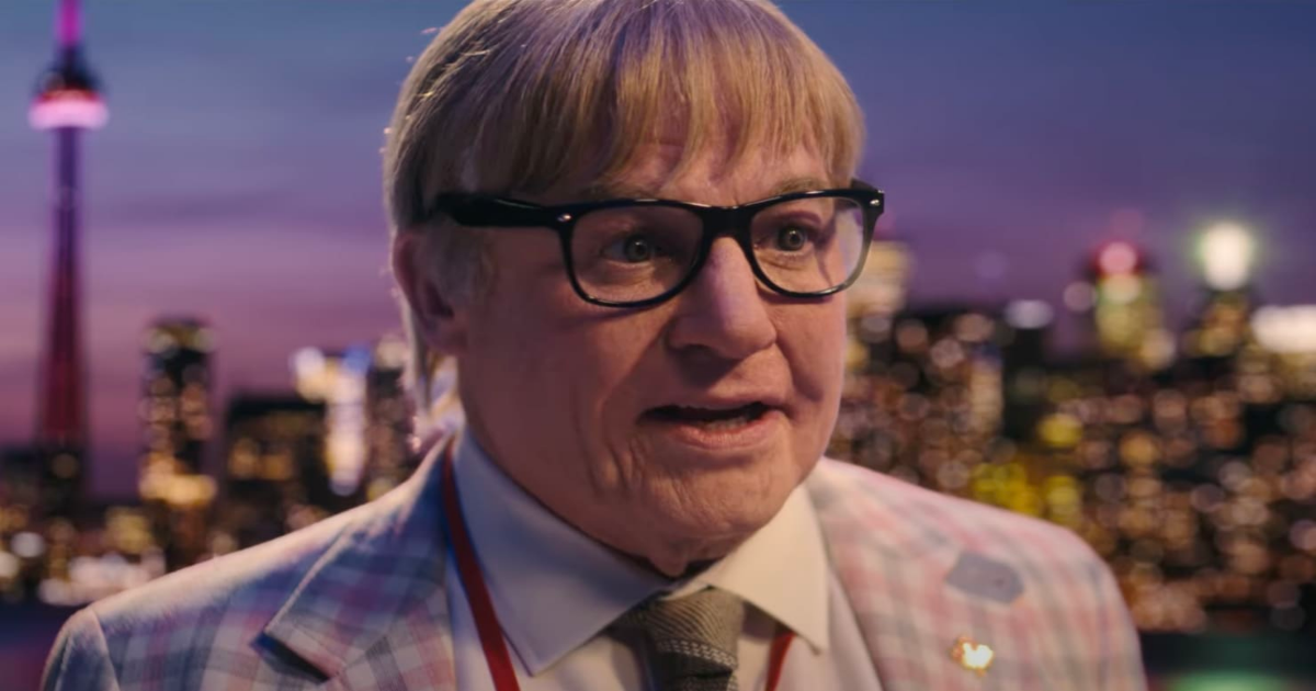 Mike Myers as Ken on the rooftop in The Pentaverate