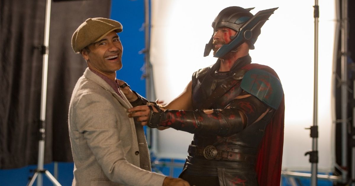 Thor: Ragnaok director Taika Waititi on set with Chris Hemsworth in full Thor costume. 