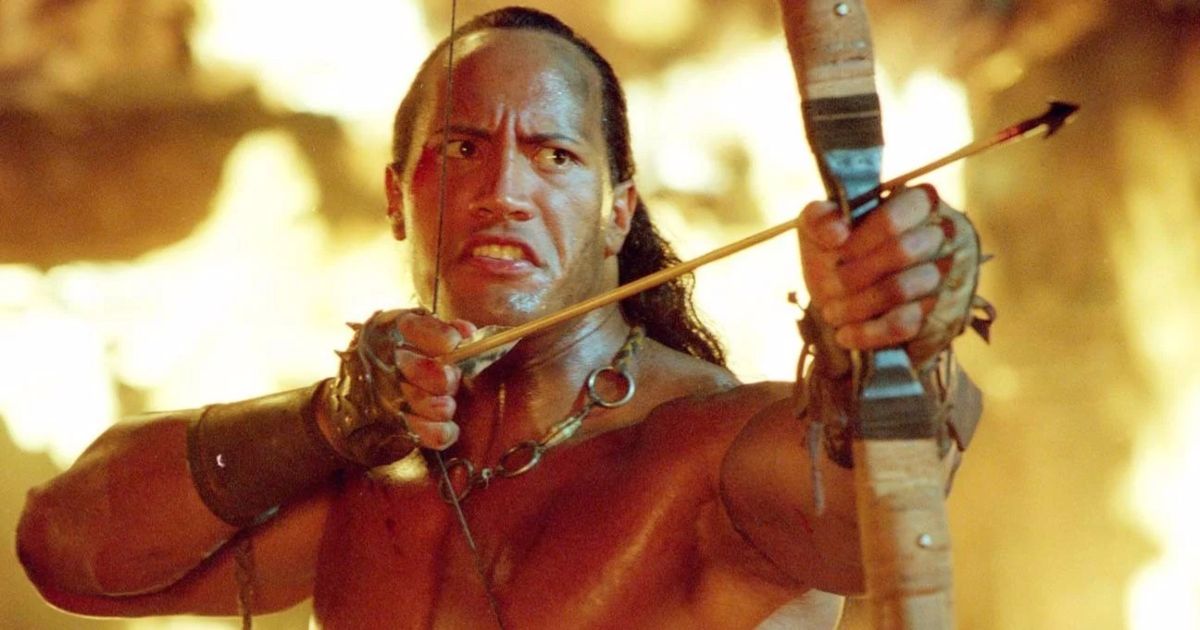 Dwayne The Rock Johnson drawing a bow and arrow in The Scorpion King