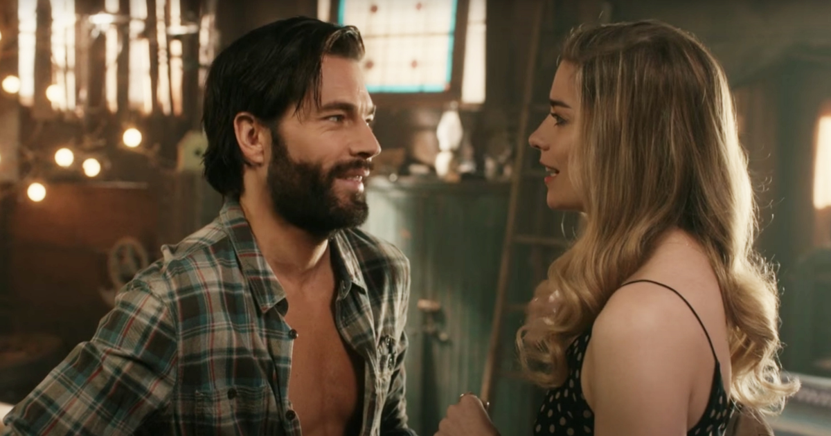 Tim Rozon and Annie Murphy in a bar in Schitt's Creek