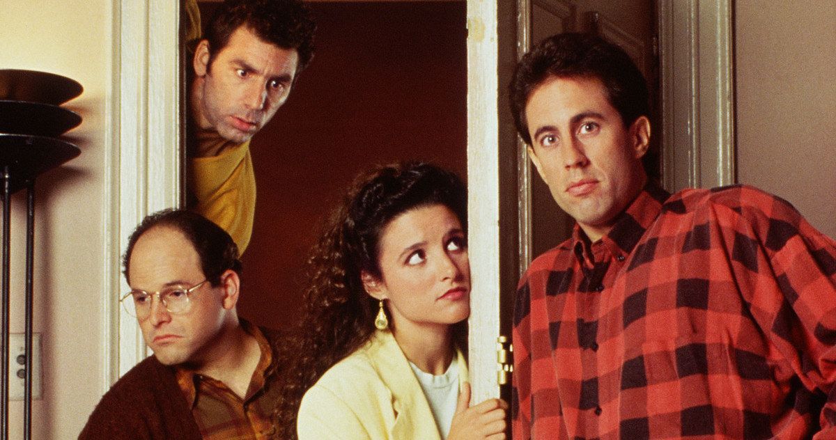 The cast of Seinfeld looking in different directions by a door