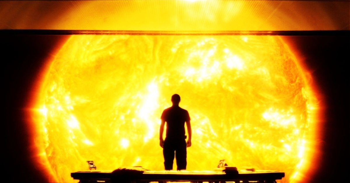 A silhouette stands on the observation deck in the movie Sunshine