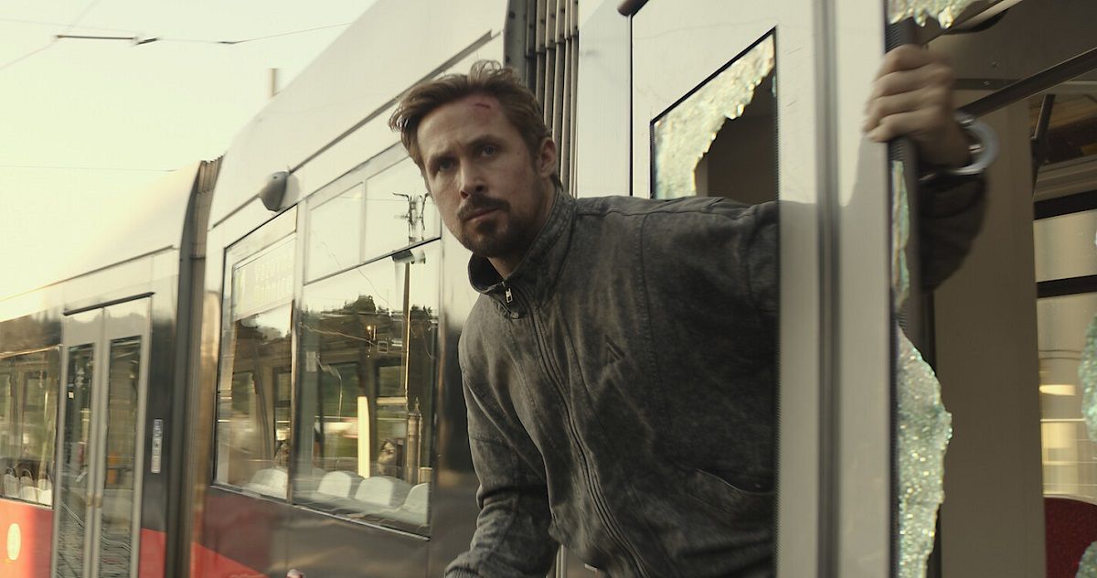 Ryan Gosling on a train in The Gray Man