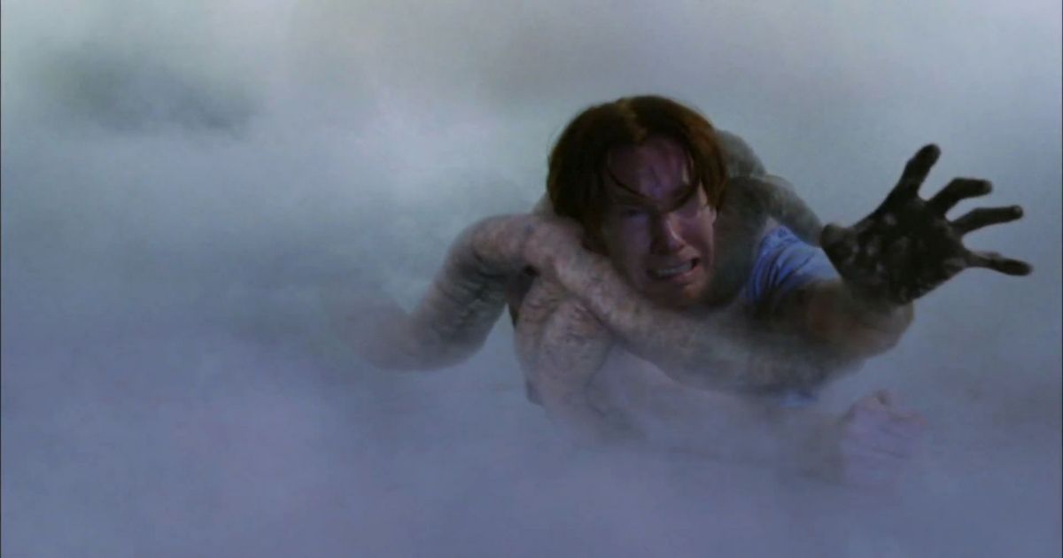 A man dragged away into The Mist by a tentacle