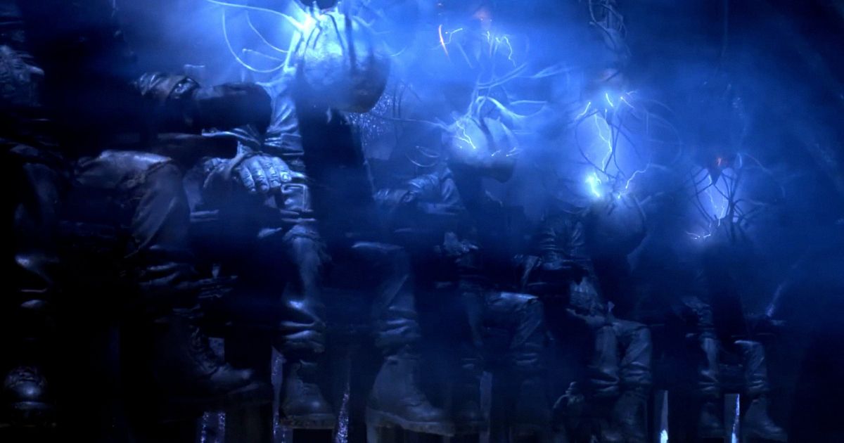 Giants being electrocuted in chairs in Phil Tippett's Mad God