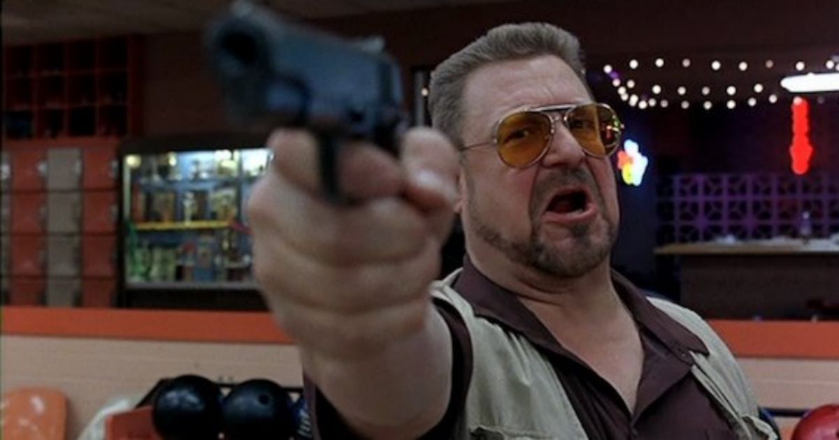 John Goodman pointing a gun in The Big Lebowski