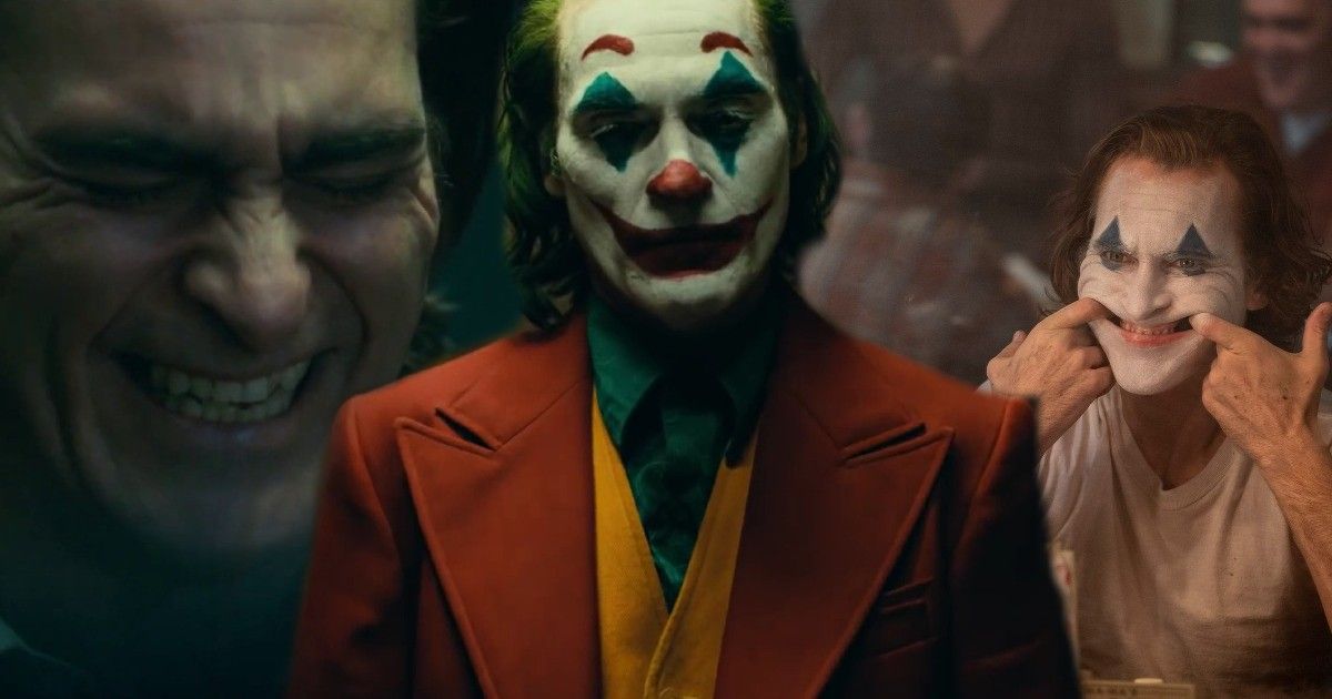 Joaquin Phoenix smiling and laughing in Joker as Arthur Fleck