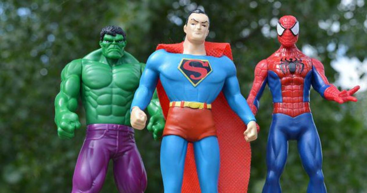 Superhero toys Hulk, Superman, and Spider-Man looking stupid