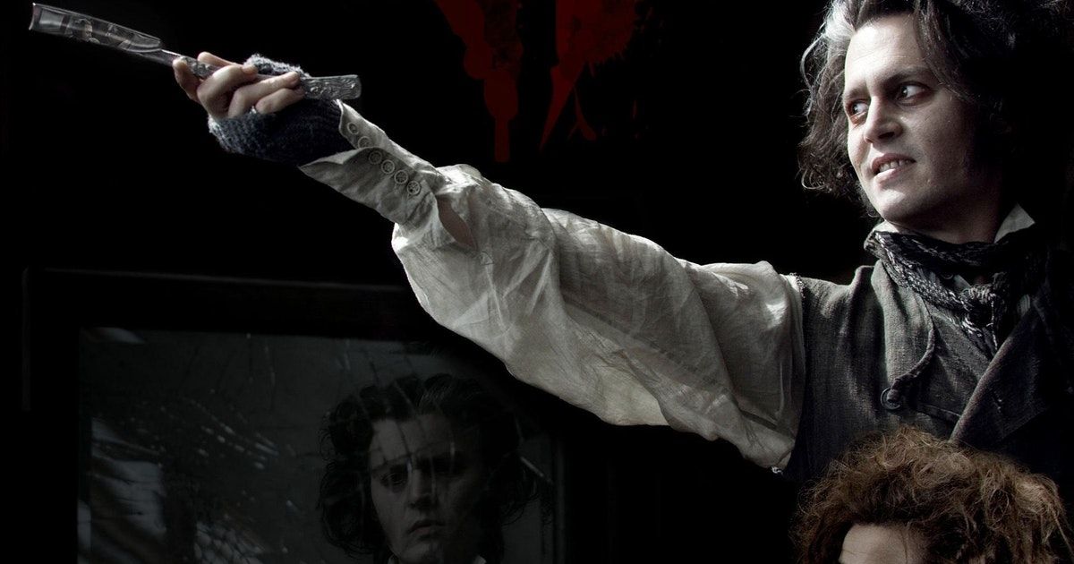 Johnny Depp holds up razor; his clothing looks worn and dirty, in Sweeney-Todd: The Demon Barber of Fleet Street