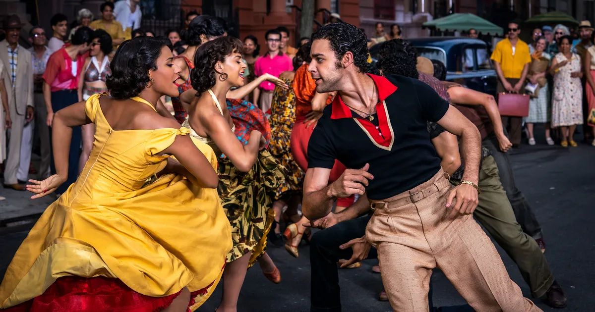 Group of Puerto Ricans dance on street. 