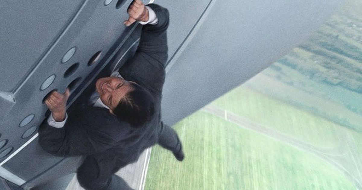 Ethan Hunt hands on to a plane in Mission: Impossible - Rogue Nation