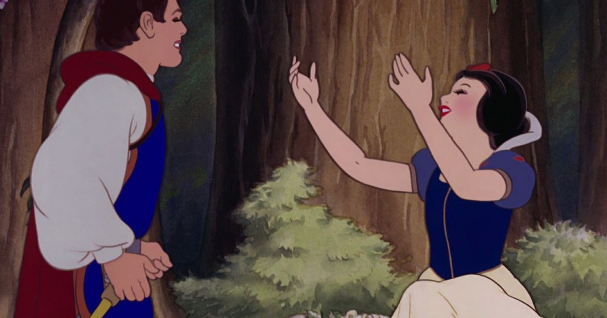 Snow White is awakened by the Prince's kiss and "saved".