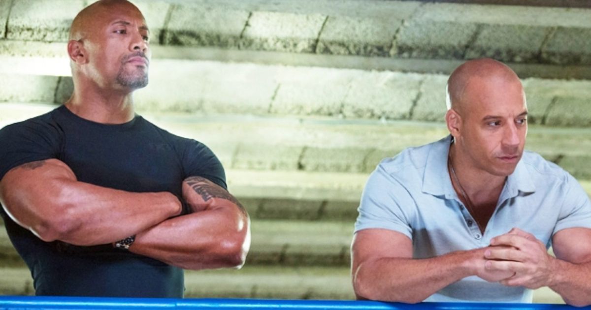 Dwayne The Rock Johnson looking down on Vin Diesel in Fast and Furious