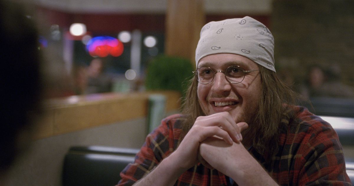 Jason Segal como David Foster Wallace em O Fim da Turnê