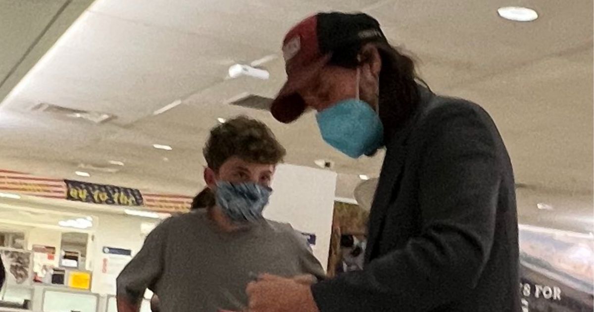 Keanu Reeves Exchange with Young Fan at Airport Goes Viral