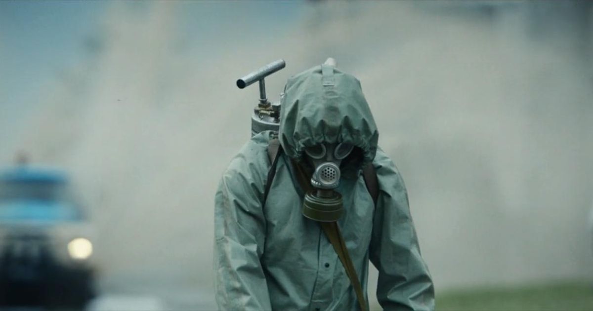 A worker cleaning the impacted area following the explosion.