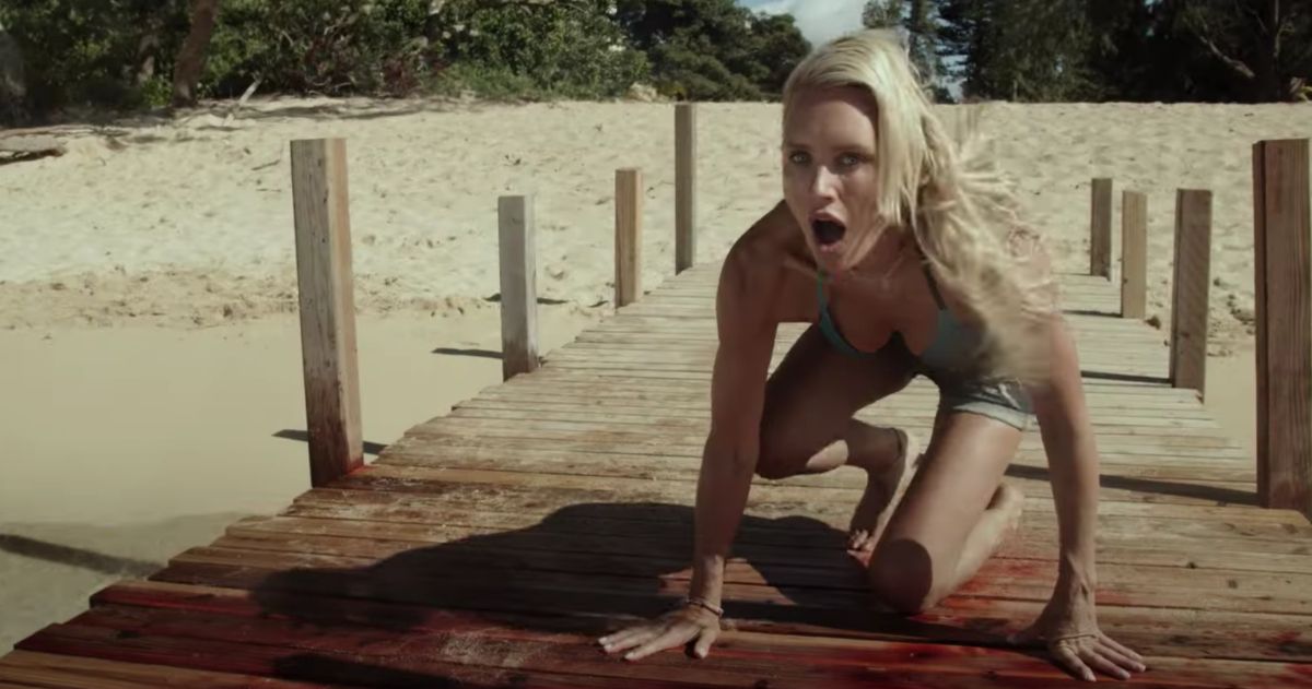 Nicky Whelan sees a shark in Maneater movie